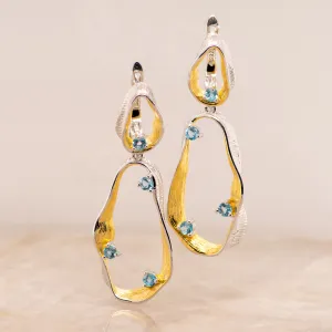 Swirl Blue Topaz Earrings in Sterling Silver